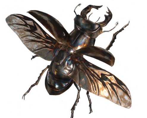 Flying giant Stag Beetle made of metal with clear resin wings