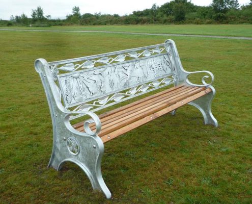 Bodmin Beacon Park Benches | Bodmin, Cornwall | Thrussells Bodmin Beacon Park heritage benches made of metal with oak seat slats in park land. Made by Thrussells. Public Art Cornwall