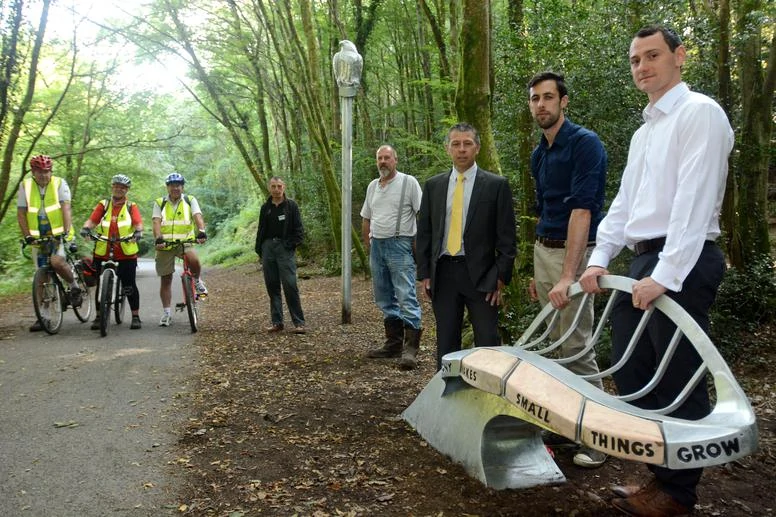 The official opening of the Plym Valley Heritage Trail Thrussells pose for picture with council officials and cyclist as part of the unvieling day of the Plym Valley Heritage trail in Plym Woods. Plymouth public art