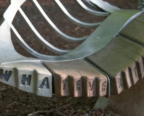 Giant Leaf Bench on the Plym Valley Heritage Trail | Plymouth | Thrussells one side of a two sided giant leaf bench made of oak and metal. Plymouth public art