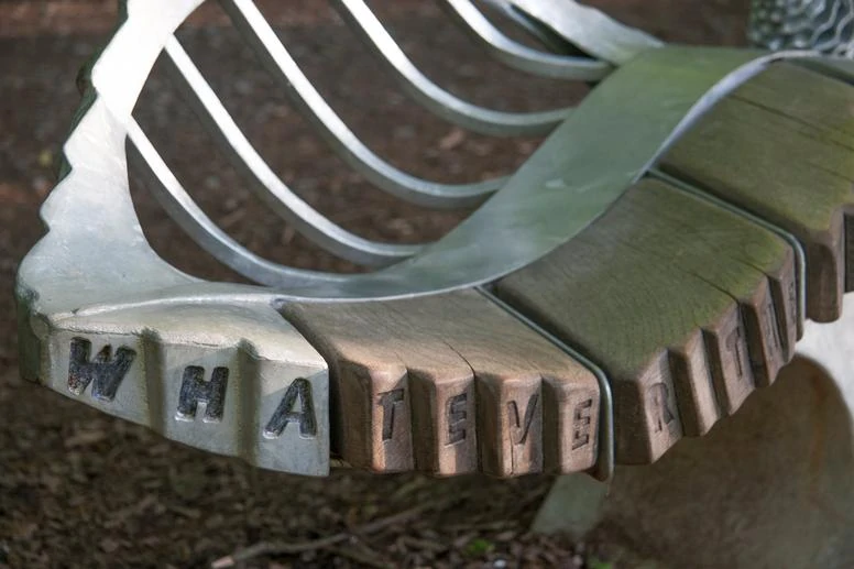 Giant Leaf Bench on the Plym Valley Heritage Trail | Plymouth | Thrussells one side of a two sided giant leaf bench made of oak and metal. Plymouth public art