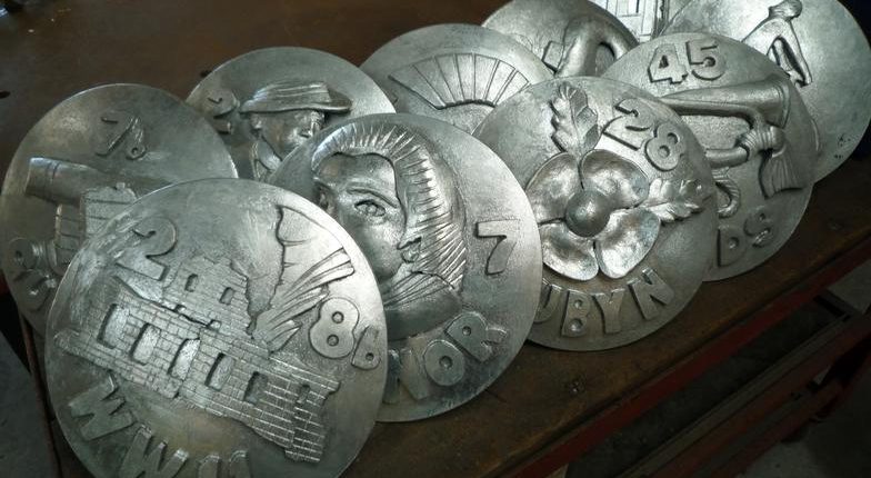 Devonport Heritage Trail, eighty plaques across town of Devonport 2010 | Plymouth | Thrussells Devonport Heritage Trail, eighty metal plaques installed across town of Devonport. photo depicts ten plaques with relief metal imagery installed in 2010. Made by Thrussells. Plymouth public art