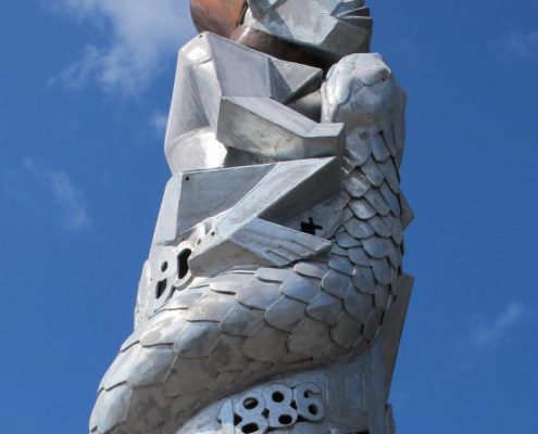H M Stanley Sculpture | St Asaph, North Wales | Thrussells fertility figure sits a top of a metal sculptural column. Public Art Wales