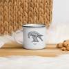 White enamel mug with Thrussells grey bird in kitchen