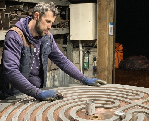 Heart of Kerdroya - Thomas applying the finishing wax Golden Tree Productions & Thrussells